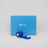 Venda cohesiva elástica azul Cotak para vendaje compresivo en fisioterapia