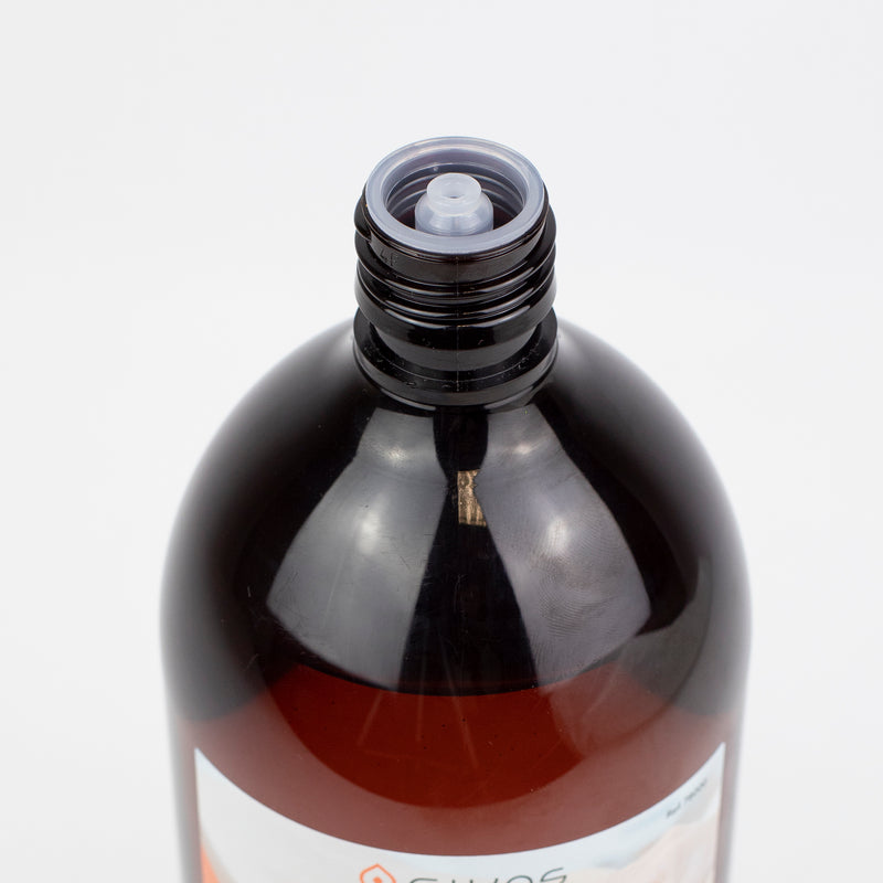 Detalle del tapón dosificador del aceite de almendra dulce Cikos en formato 1 litro, práctico para uso profesional en fisioterapia.