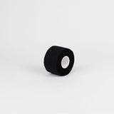 Venda adhesiva Vendari Plustape negra 3,8 cm × 10 m, libre de látex, alta adherencia y uso profesional en fisioterapia.