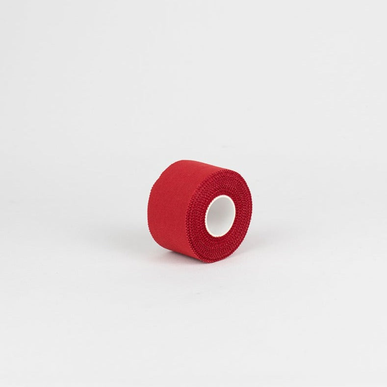 Venda adhesiva no elástica Vendari Plustape roja 3,8 cm × 10 m, resistente y libre de látex para uso profesional.